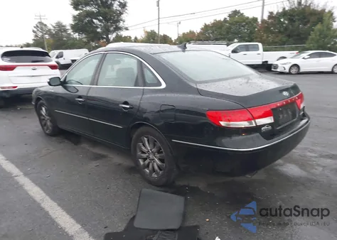 2009 Hyundai Azera Limited z USA, uszkodzony, nr VIN KMHFC46F69A342687